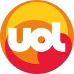 Logo da UOL em formato circular com cores amarelo, laranja e vermelho.